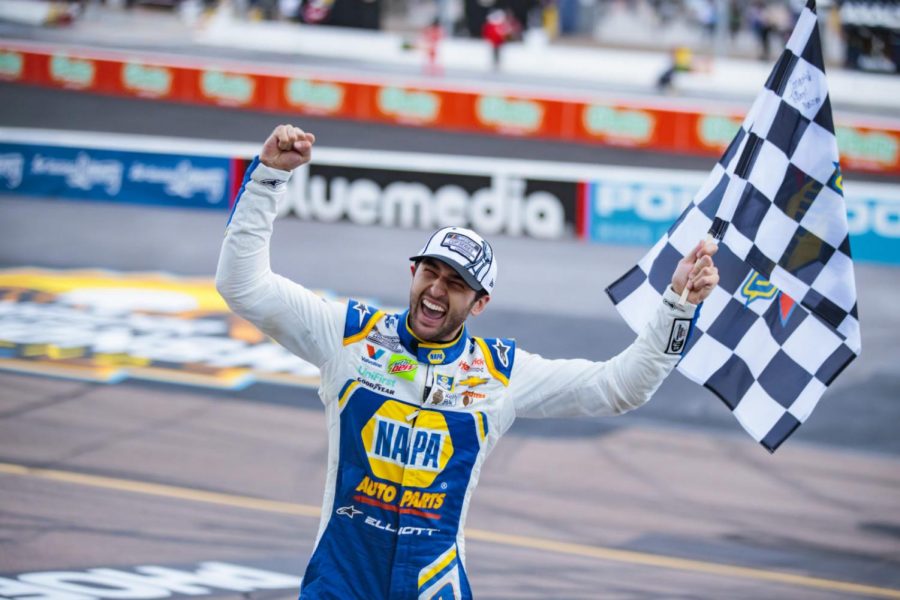 Avondale, Arizona, USA; NASCAR driver Chase Elliott celebrates with the checkered flag after winning the NASCAR Cup Series Championship at Phoenix Raceway.