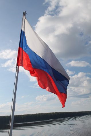 Russian flag flying on board boat on the Volga River by flowcomm