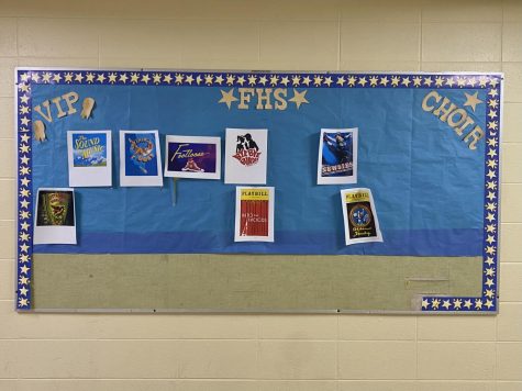 The choir wing bulletin board only has 8 shows remaining. Students are counting down the days until theres only one left!